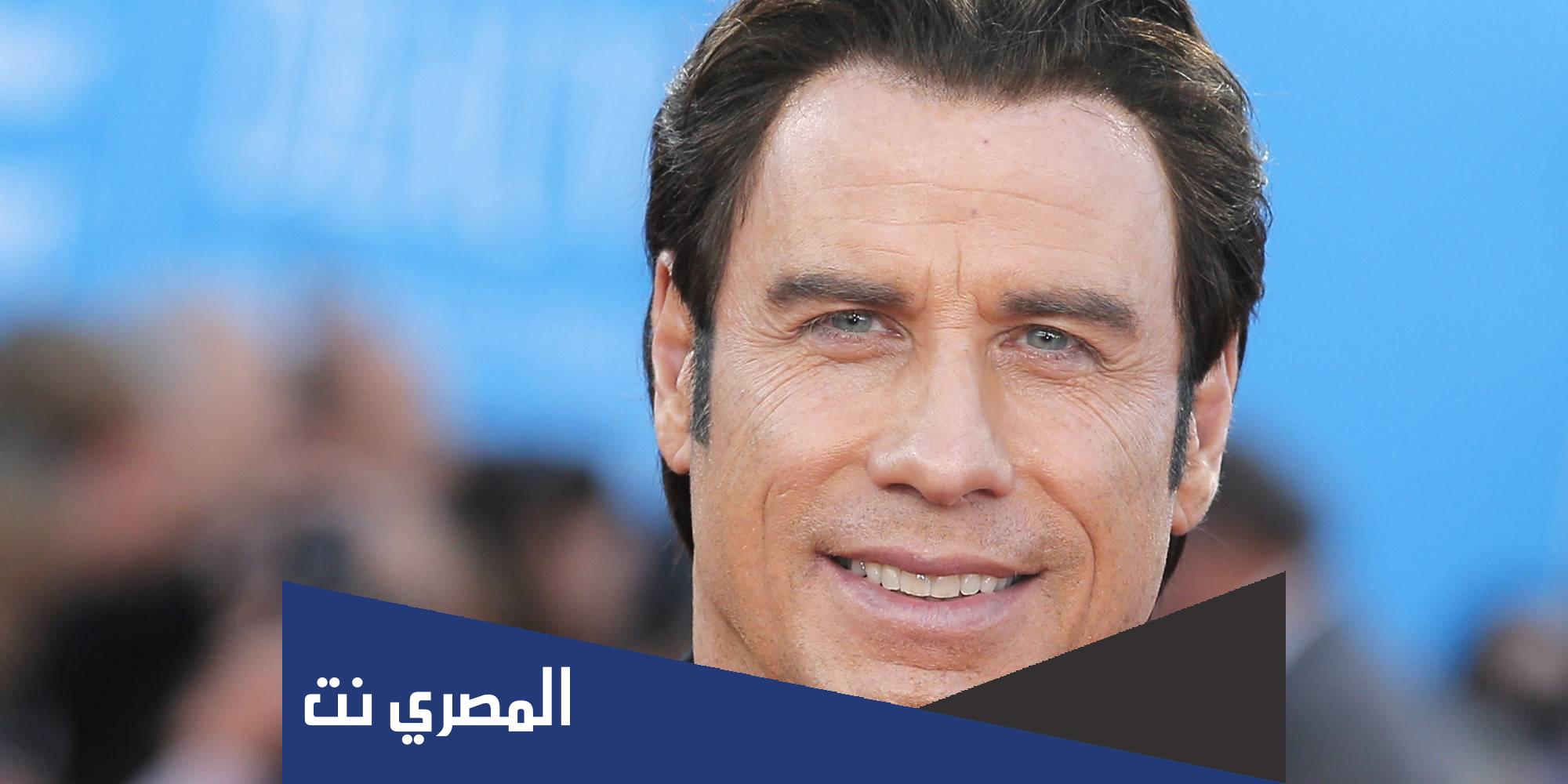 من هو جون ترافولتا وزوجته