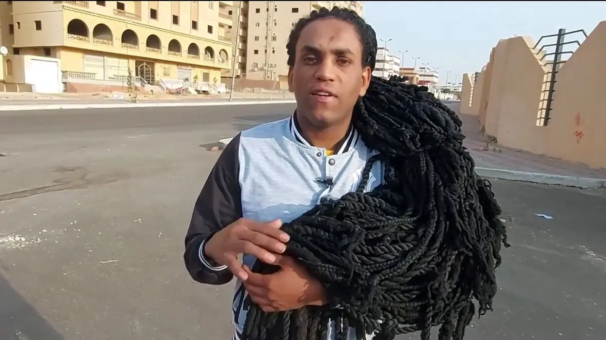 من هو صاحب اطول شعر بمصر 2022